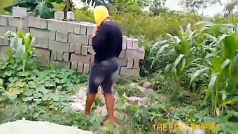 Blonde Mom Inspects Her Student'S Maize Crop In The Open Air