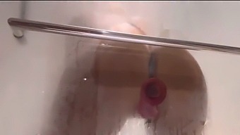 Get Ready For A Shower Of Pleasure With Max Ryan And Her Dildo
